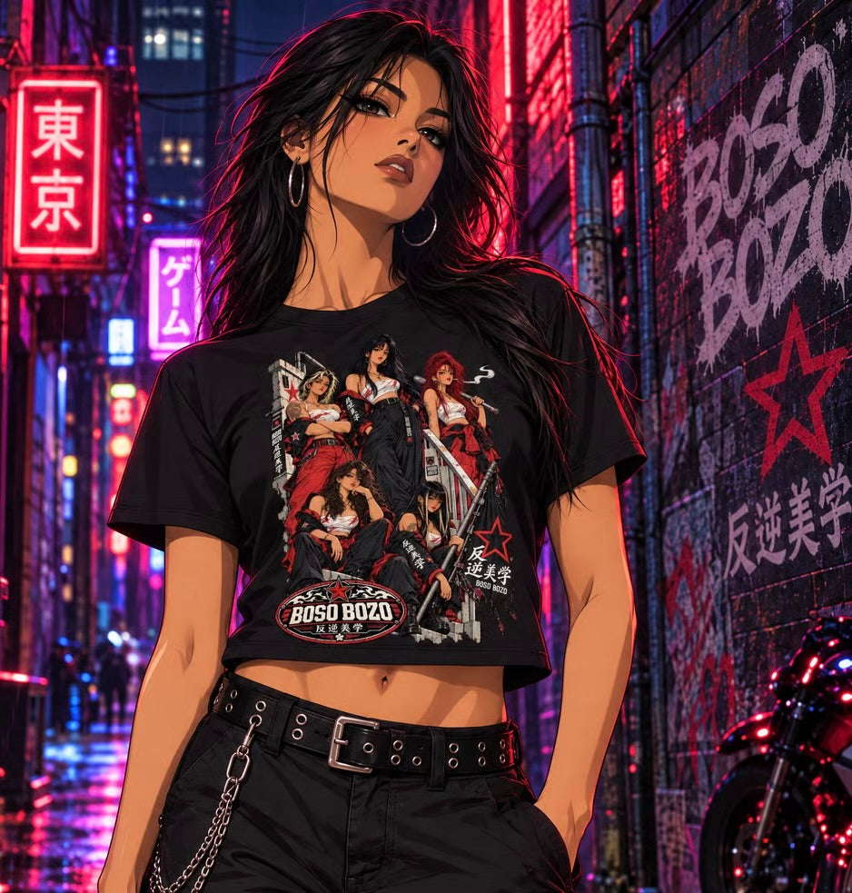 A stylized woman stands in a neon-lit city street at night wearing a black cropped graphic T-shirt with a large multicolor anime-style print and BOSO BOZO text/logo on the front, paired with black pants and a chain belt.